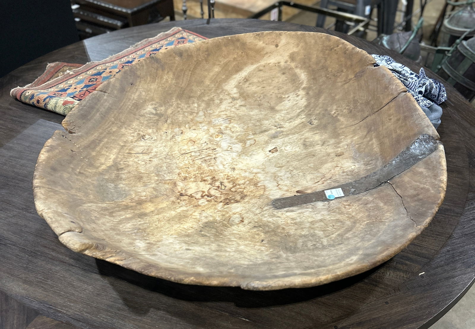 A large turned wood bowl with metal repair (1 of 1)