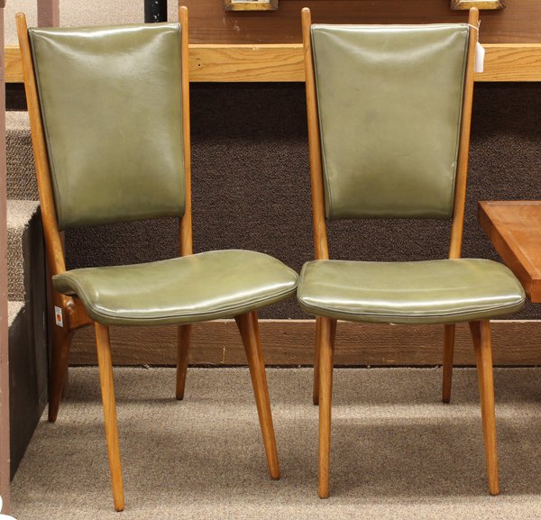 Vladimir Kagan side chairs: (lot of 2) Pair of Vladimir Kagan for Grosfeld house side chairs, executed in walnut circa 1950, the continuous frame framing the leather wrapped back and continuing to the upswept seat rising on tape
