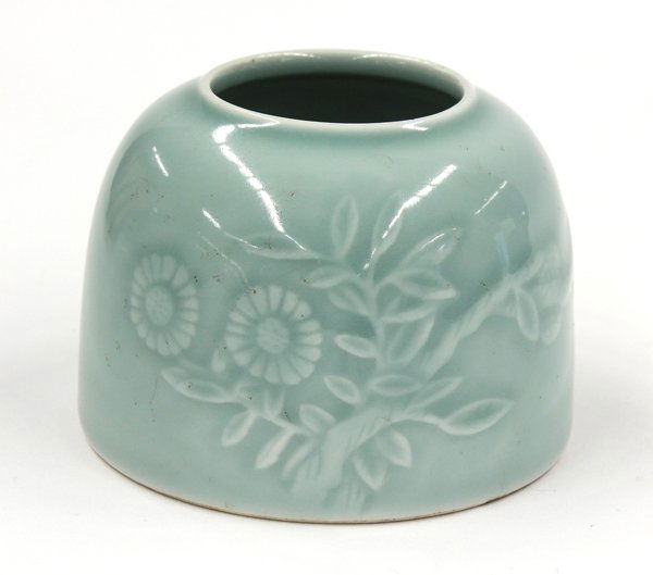Chinese Celadon Brush Washer: Chinese celadon glazed porcelain brush washer, of bee hive form molded with flowers beside a lychee branch along with a pair of fluttering butterflies, the recessed base with an apocryphal underglaze