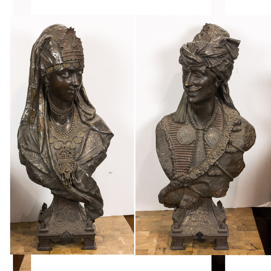 A pair of Continental Orientalist patinated metal busts of a North African man and woman (1 of 3)
