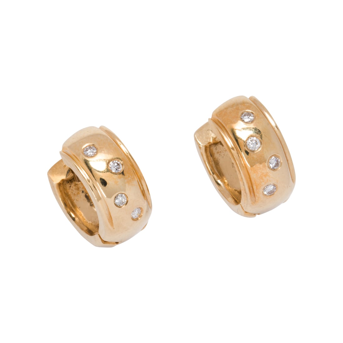 A pair of diamond and 14k gold huggie earrings: A pair of diamond and 14k gold huggie earrings each in-set with four round brilliant-cut diamonds; 4.95 dwt; length: 1/2 in