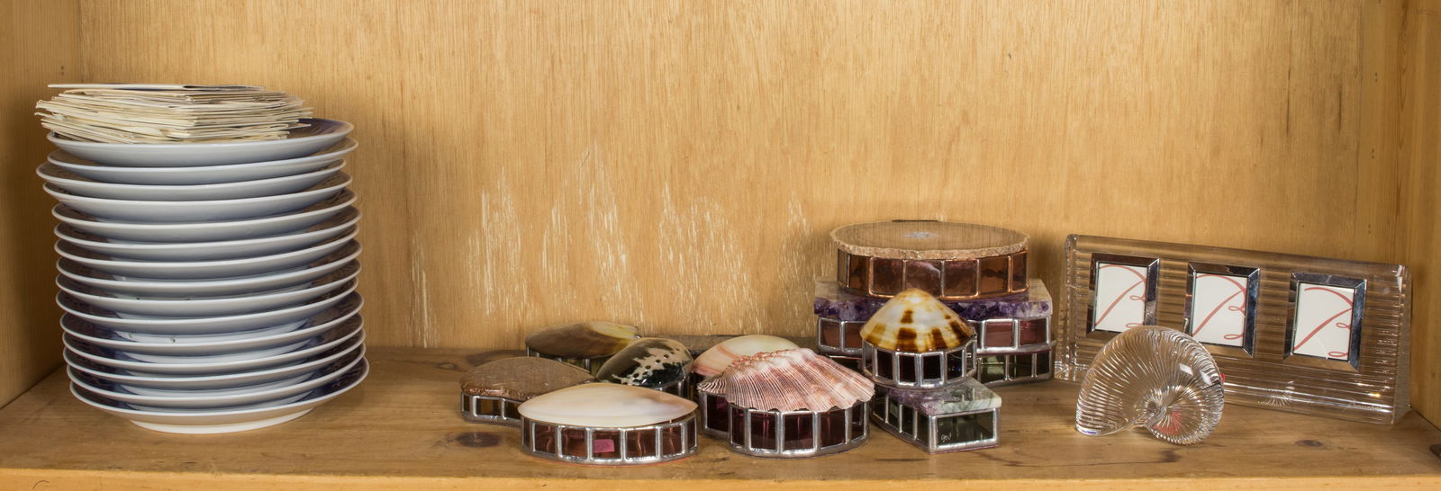 An assembled group of Baccarat glass, trinket boxes and Royal Copenhagen Christmas plates (1 of 1)