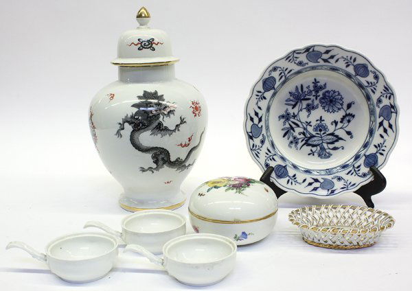German Porcelain Group: (lot of 7) Associated group of Meissen porcelain including a blue onion pattern bowl, a ginger jar decorated with a black dragon, covered box decorated with deutsch blumen, a reticulated basket, and t