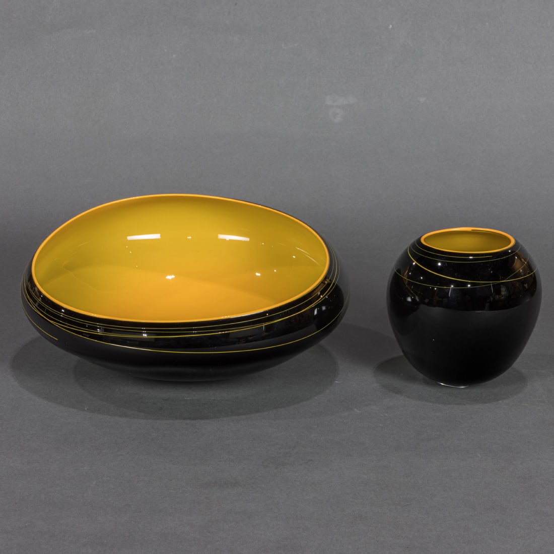 Chihuly Glass Workshop, Raven Black Baskets, lot of two: Chihuly Glass Workshop, Raven Black Baskets, lot of two USA, 2015 Chihuly Studio Edition, glass, engraved signature and 'CW15', largest 5'h x 10.5"dia; smaller 5"h. Provenance: Purchased Royal Ontario