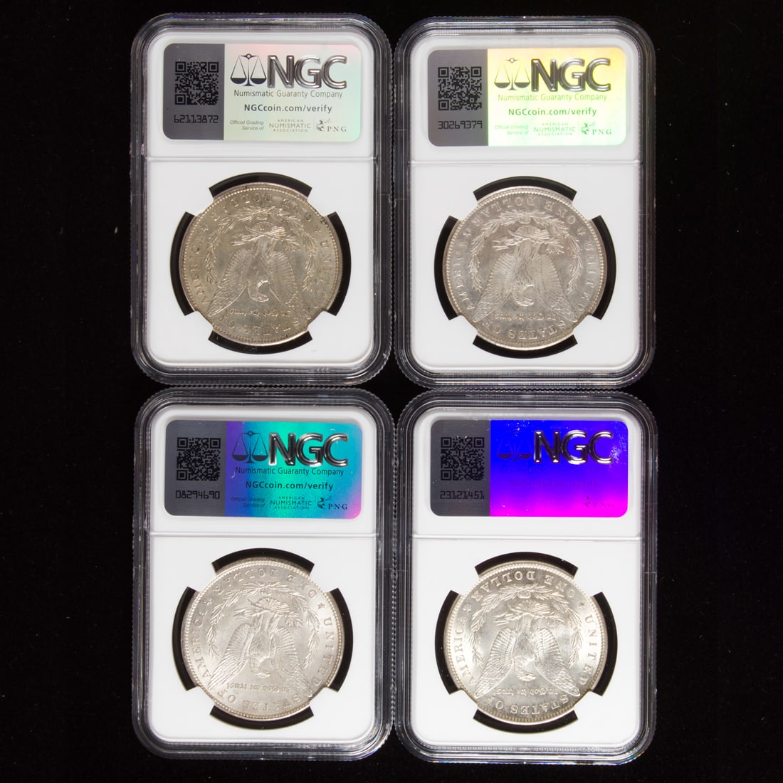 Four Morgan Silver Dollars: 1897S, 1898, 1890, 1900, all NGC MS62 (1 of 2)