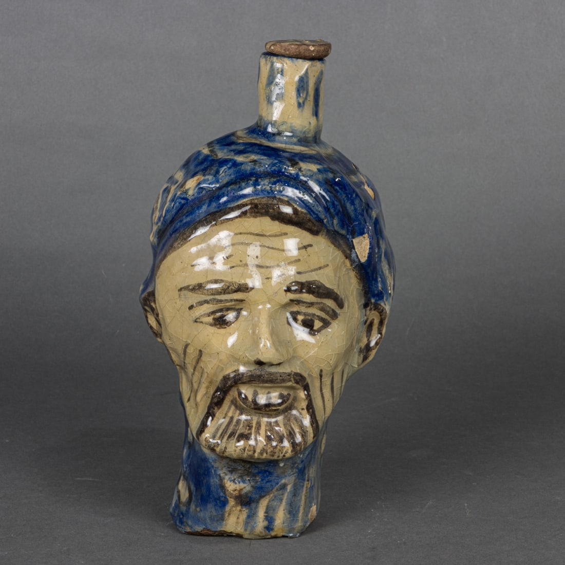 A faience pottery figural face jug (1 of 1)