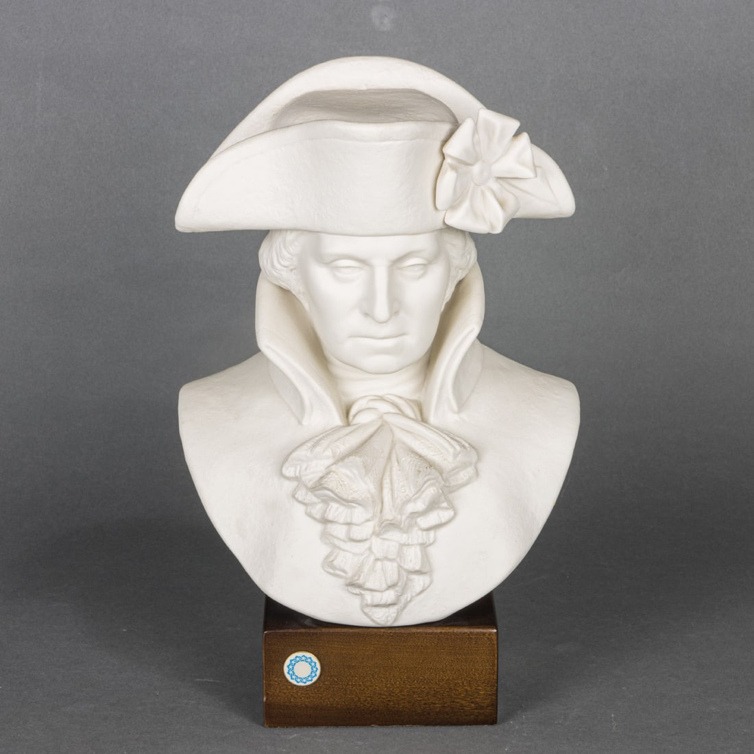 A Cybis bisque porcelain bust of George Washington raised on wood plinth (1 of 1)