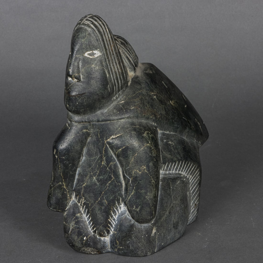 An Inuit carved stone figure of a mother and child (1 of 1)