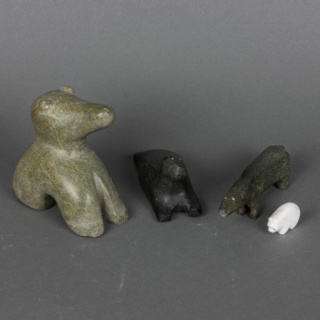 Four Inuit carved stone figures (1 of 1)