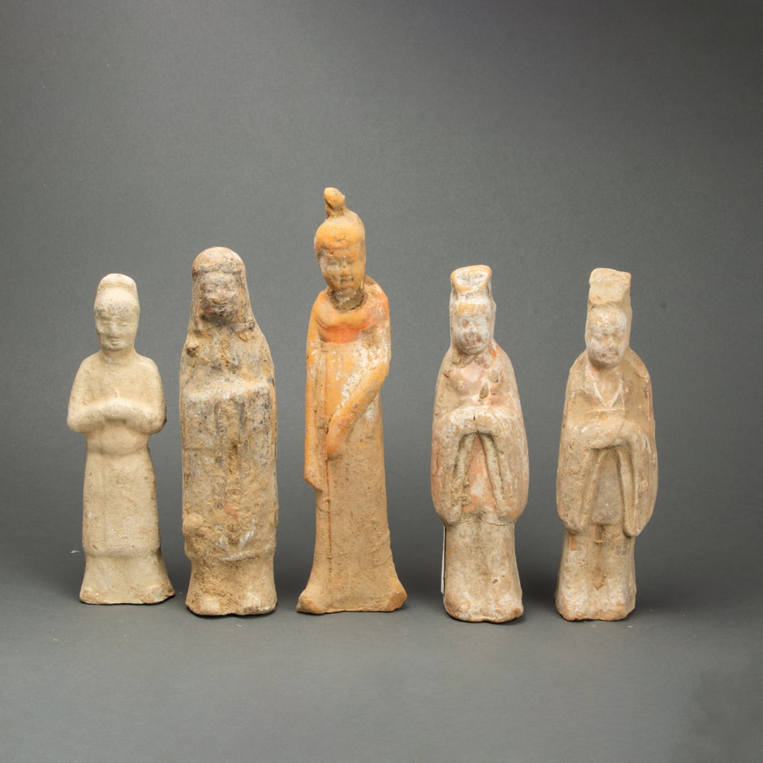 (lot of 5) Chinese pottery attendant figures: (lot of 5) Chinese pottery attendant figures. Han dyansty, from 8.375" to 10.5" high.