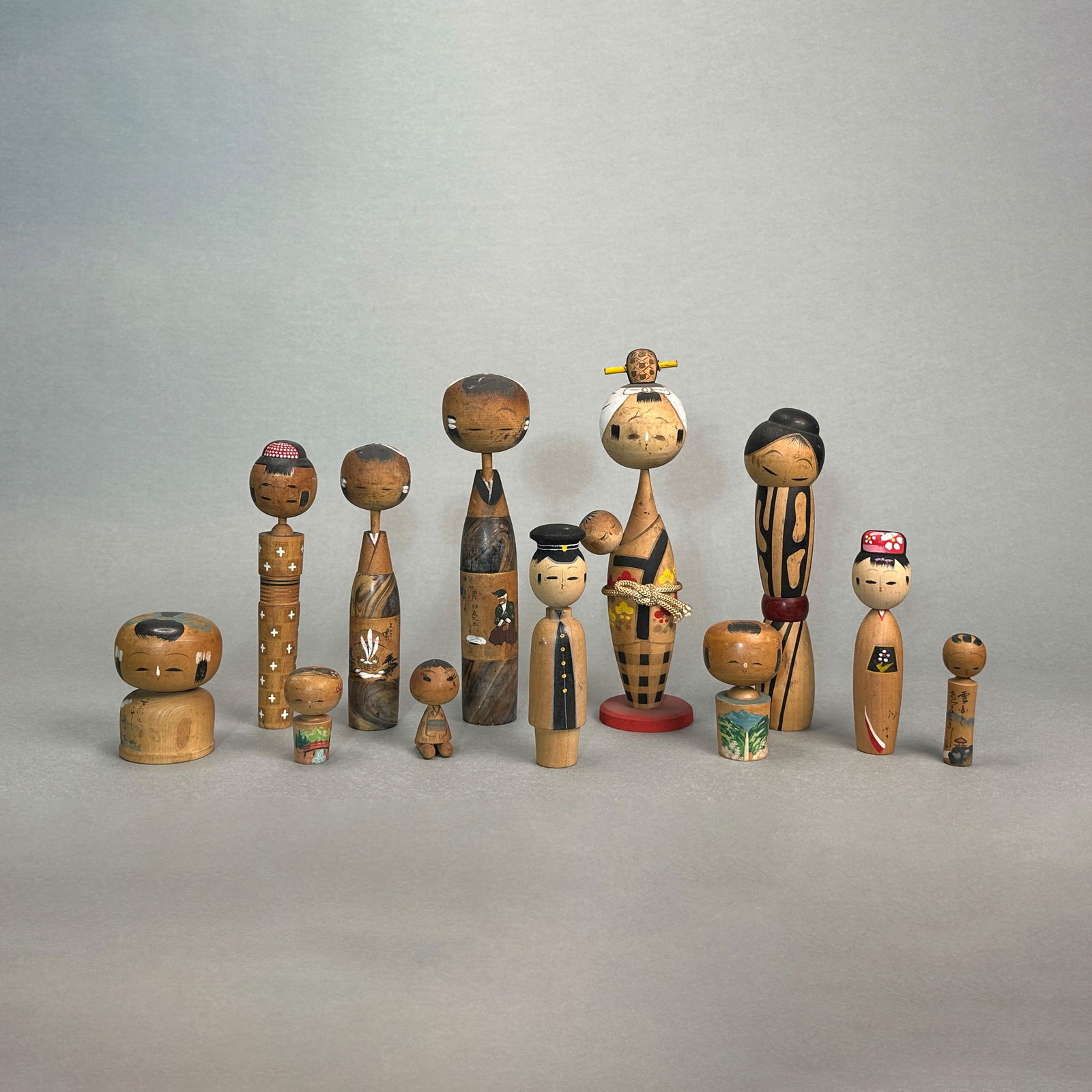 Group of Twelve Japanese Painted Wood Dolls (1 of 6)