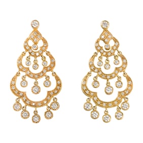 A pair of diamond and 14k gold earrings