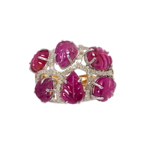 A carved ruby, diamond, 14k gold and silver ring