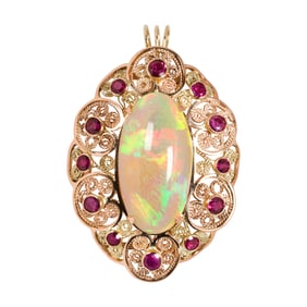 An opal, ruby and 14k rose gold pendant