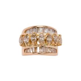 A diamond and 14k gold ring