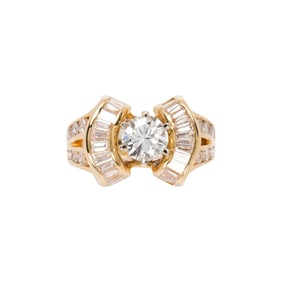 A diamond and 18k gold ring