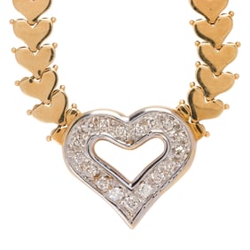 A diamond and 14k bi-color gold necklace