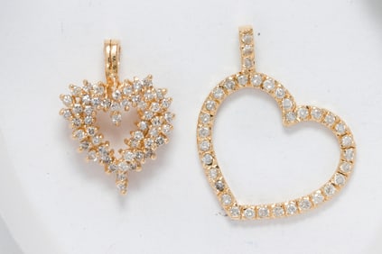 Two diamond and 14k gold pendants