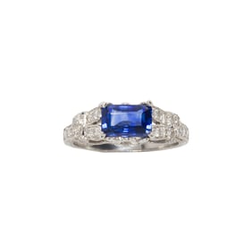 A sapphire, diamond and platinum ring