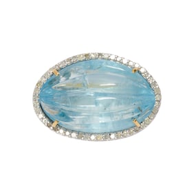 An aquamarine, diamond, silver and 14k gold ring