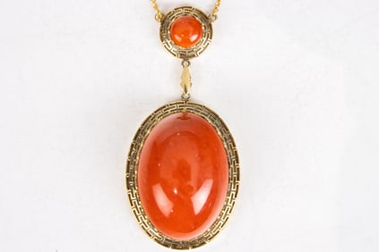 A coral and 14k gold pendant necklace