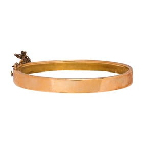 An 18k gold bangle bracelet