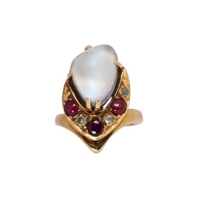 A moonstone, ruby, diamond and 18k gold ring