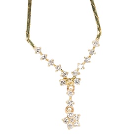 A diamond and 14k gold necklace