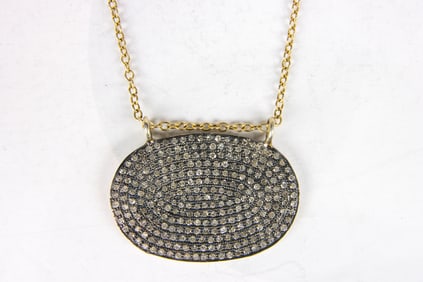 A diamond pendant necklace