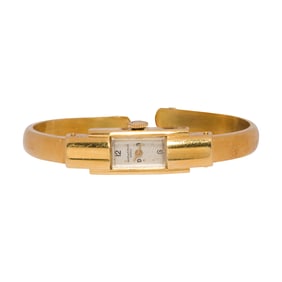 A Baume & Mercier 18k gold watch cuff bracelet