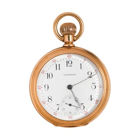 A Waltham, 14k gold open face pocket watch