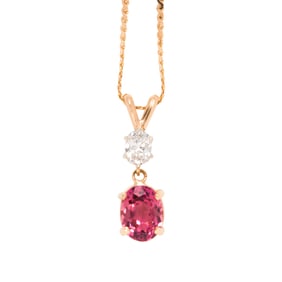 A pink tourmaline, diamond and 14k gold pendant necklace