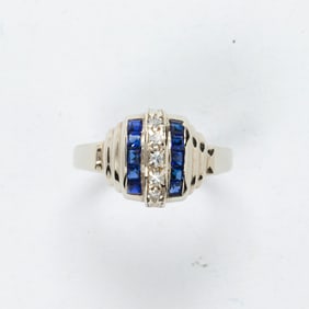 A diamond, sapphire and 14k white gold ring