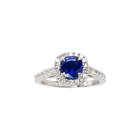 A sapphire, diamond and 14k white gold ring