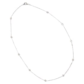 A diamond and 14k white gold necklace