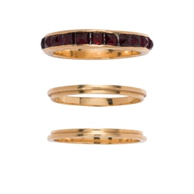 A garnet and 14k gold three-ring set