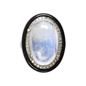 A moonstone, diamond, onyx, and silver ring