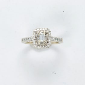 A diamond and 14k white gold ring