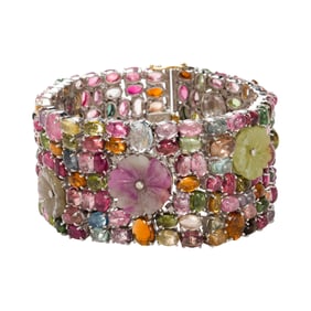 A multi-gem and silver bracelet