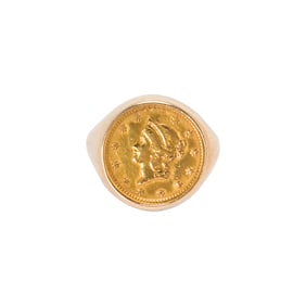 A 14k gold coin ring