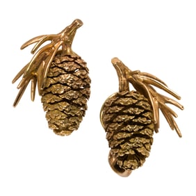 A pair of 14k gold earrings