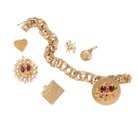 A 14k gold charm bracelet