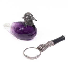 Two Continental bird form plated claret jug and magnifying glass