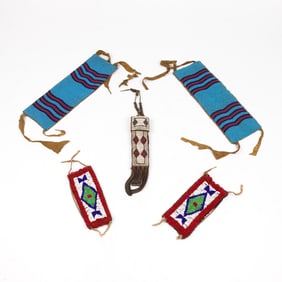 A lot of Plains beadwork: a knife case and two pairs of guards