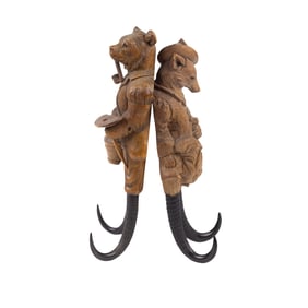 Two Black Forest carved walnut and horn coat/wall/whip hooks