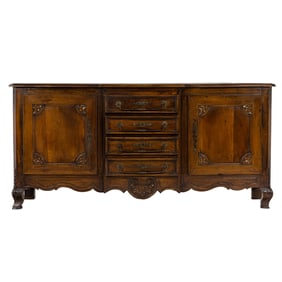 A Continental Rococo walnut credenza