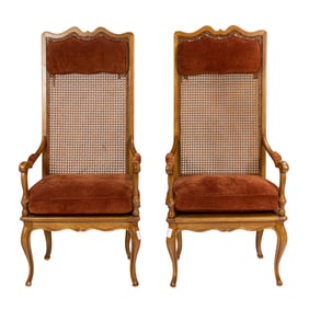 A pair of French Provincial high back armchairs