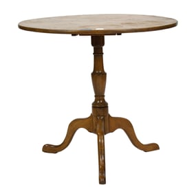 A George III mahogany tilt-top tea table