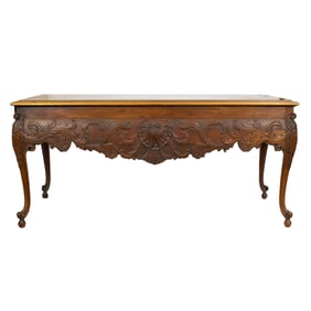 A Continental Rococo Revival mahogany center table circa 1850