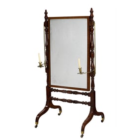 An English Victorian cheval mirror, circa 1860, with adjustable brass candle arms, flanking the